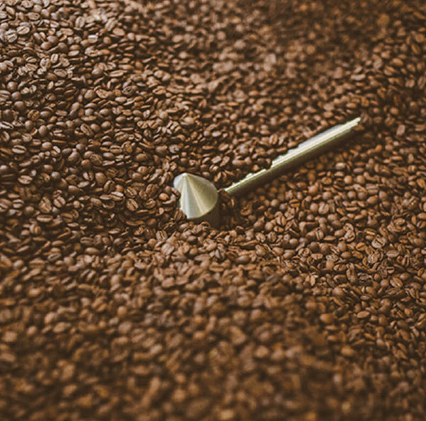 Coffee beans spinning in Loring roaster